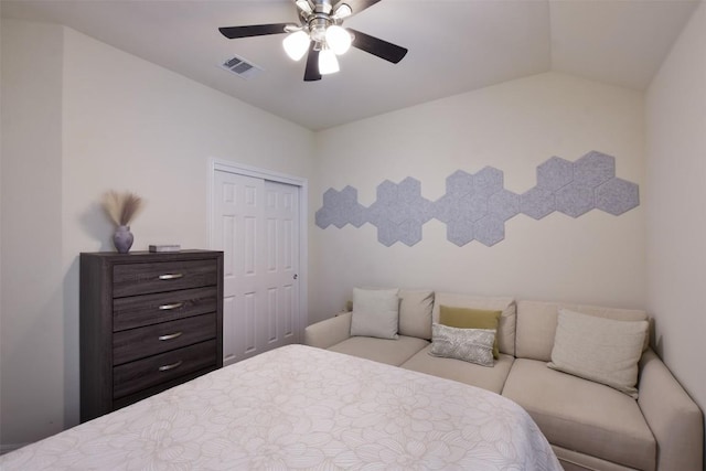 216 Walkup Ln, Leander, TX 78641 - bedroom with a closet, vaulted ceiling, and ceiling fan