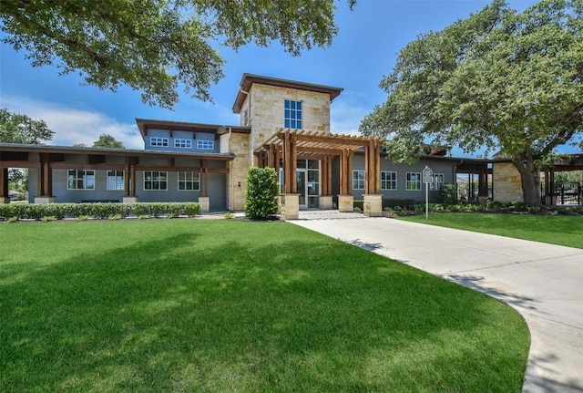 216 Walkup Ln, Leander, TX 78641 - view of front facade with a pergola, stone siding, and a front lawn