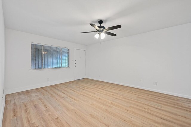 2303 E E Side Dr Unit 102, Austin, TX 78704 - empty room featuring light wood-style floors and a ceiling fan