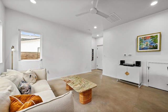 1001 Walter St Unit 2, Austin, TX 78702 - living area with recessed lighting, ceiling fan, and finished concrete flooring