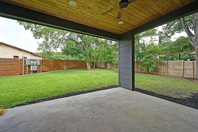 1001 Walter St Unit 2, Austin, TX 78702 - fenced backyard featuring a patio area and ceiling fan