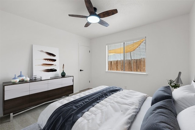 2205 Thornwild Pass, Austin, TX 78758 - carpeted bedroom featuring a ceiling fan