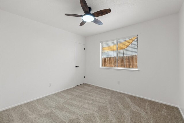 2205 Thornwild Pass, Austin, TX 78758 - unfurnished room with light colored carpet and ceiling fan