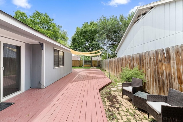 2205 Thornwild Pass, Austin, TX 78758 - deck with a fenced backyard and a patio area