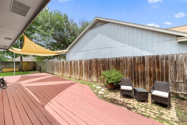 2205 Thornwild Pass, Austin, TX 78758 - wooden terrace featuring a fenced backyard