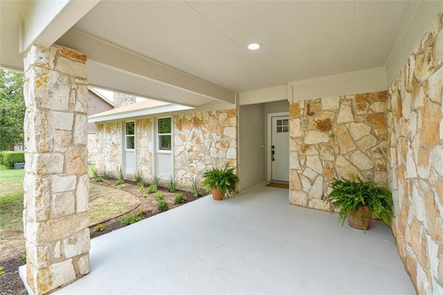 913 Spring Tree St, Round Rock, TX 78681 - entrance to property with stone siding and a patio area