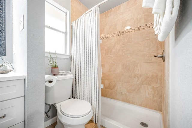 1906 Garden Villa Dr, Georgetown, TX 78628 - bathroom with tiled shower and a textured wall