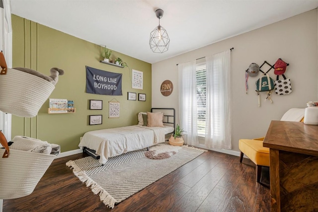 1906 Garden Villa Dr, Georgetown, TX 78628 - bedroom with wood finished floors and baseboards
