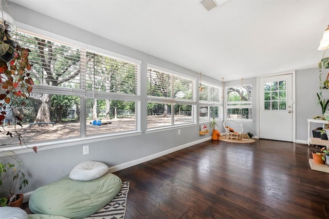 1906 Garden Villa Dr, Georgetown, TX 78628 - sunroom / solarium with baseboards and wood finished floors