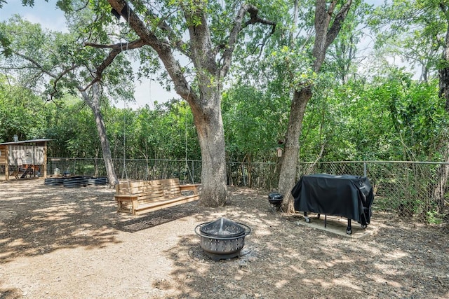 1906 Garden Villa Dr, Georgetown, TX 78628 - view of yard featuring an outdoor fire pit