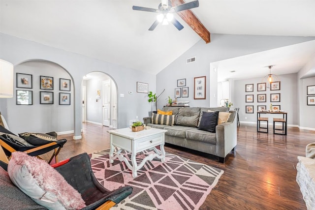 1906 Garden Villa Dr, Georgetown, TX 78628 - living area featuring arched walkways, wood finished floors, a ceiling fan, beamed ceiling, and high vaulted ceiling