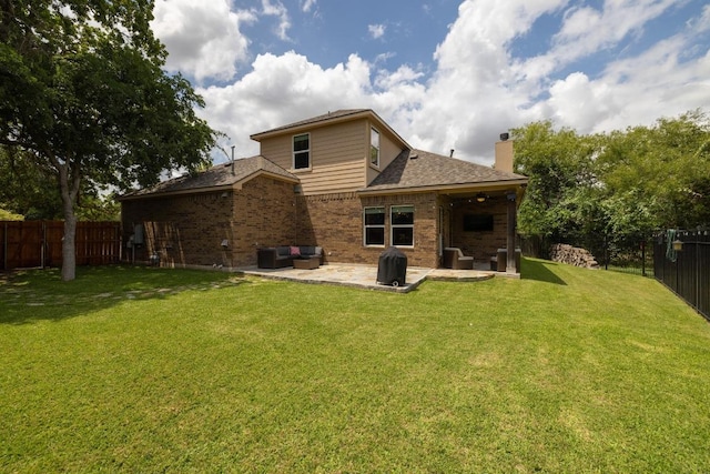 2644 Salorn Way, Round Rock, TX 78681 - back of house featuring a chimney, a patio, a fenced backyard, and brick siding
