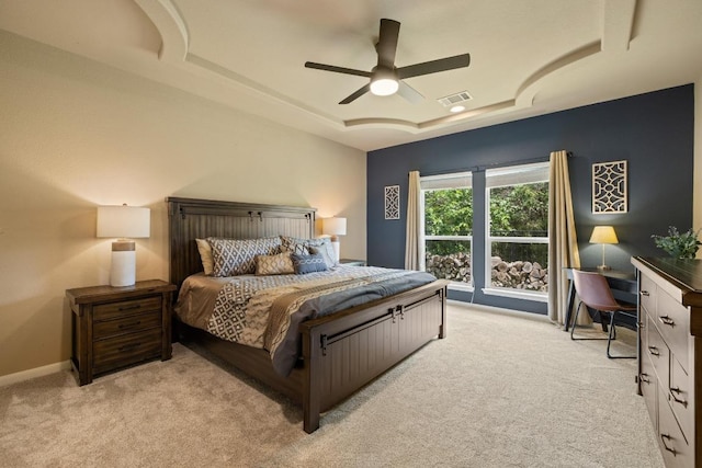 2644 Salorn Way, Round Rock, TX 78681 - bedroom with light colored carpet, a raised ceiling, a ceiling fan, and an office area