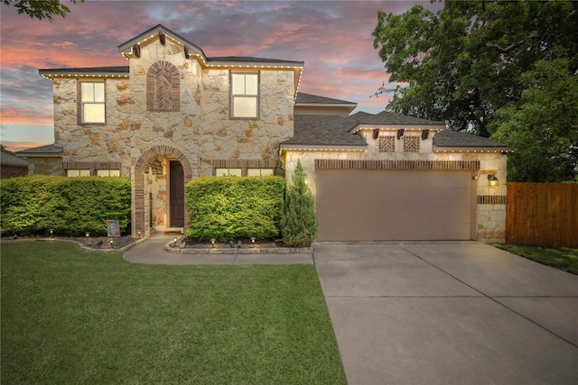 2644 Salorn Way, Round Rock, TX 78681 - view of front of property featuring stone siding, driveway, a garage, and roof with shingles
