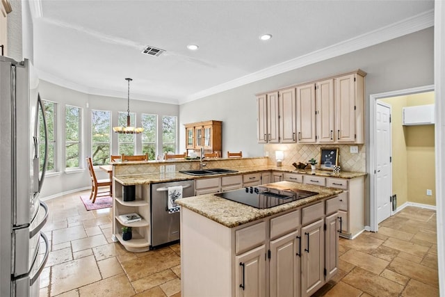 1026 Windmill Rd, Dripping Springs, TX 78620 - kitchen featuring stainless steel appliances, a sink, a peninsula, stone tile flooring, and recessed lighting