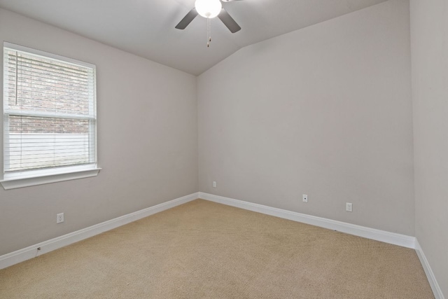 1116 Highwater Dr, Georgetown, TX 78628 - unfurnished room featuring light colored carpet, ceiling fan, vaulted ceiling, and baseboards
