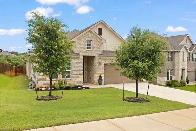1116 Highwater Dr, Georgetown, TX 78628 - view of front facade with driveway, board and batten siding, a garage, and stone siding