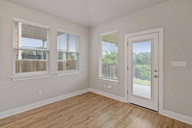 1116 Highwater Dr, Georgetown, TX 78628 - doorway to outside with light wood-style floors and baseboards