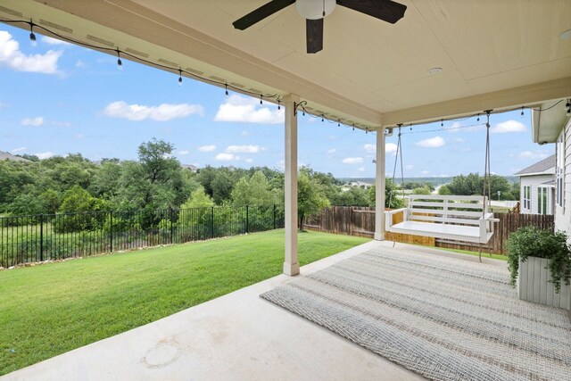 1116 Highwater Dr, Georgetown, TX 78628 - fenced backyard featuring a patio area and ceiling fan