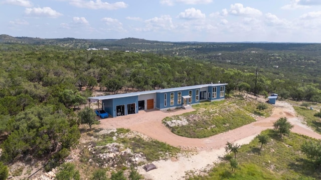 2300 Stagecoach Ranch Loop Unit B, Dripping Springs, TX 78620 - aerial view of property and surrounding area with a forest