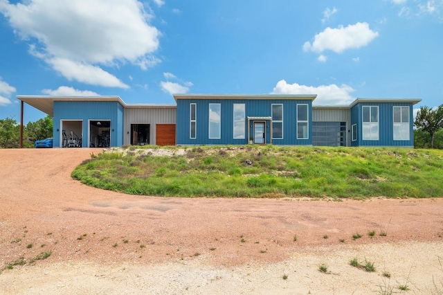 2300 Stagecoach Ranch Loop Unit B, Dripping Springs, TX 78620 - view of front of home with a detached garage and driveway