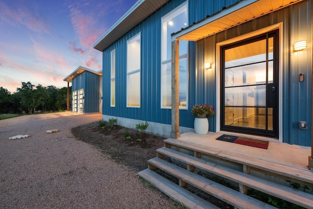 2300 Stagecoach Ranch Loop Unit B, Dripping Springs, TX 78620 - doorway to property with board and batten siding