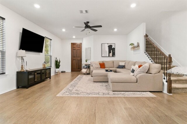 9003 Acorn Cup Dr Unit 34, Austin, TX 78748 - living area with wood finished floors, stairway, ceiling fan, recessed lighting, and baseboards