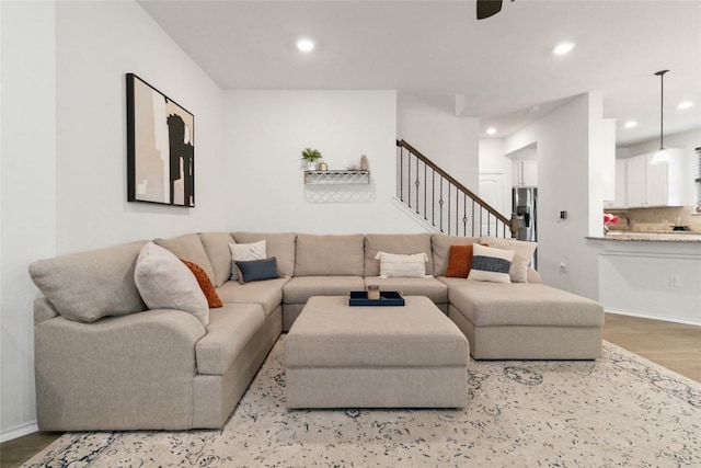 9003 Acorn Cup Dr Unit 34, Austin, TX 78748 - living room featuring recessed lighting, wood finished floors, stairway, ceiling fan, and baseboards