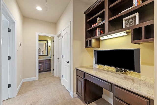 303 Bella Montagna Cir, Austin, TX 78734 - office with light carpet, built in desk, and recessed lighting