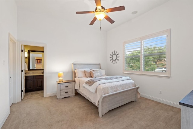 303 Bella Montagna Cir, Austin, TX 78734 - bedroom with light carpet, connected bathroom, and ceiling fan