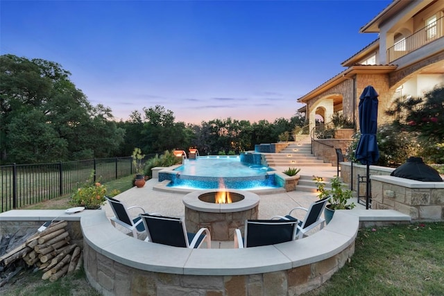 303 Bella Montagna Cir, Austin, TX 78734 - view of swimming pool featuring an outdoor fire pit, a patio area, stairs, and a pool with connected hot tub