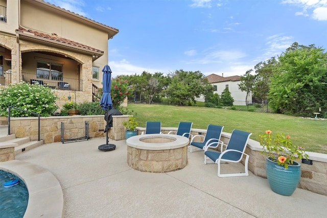 303 Bella Montagna Cir, Austin, TX 78734 - view of patio with an outdoor fire pit