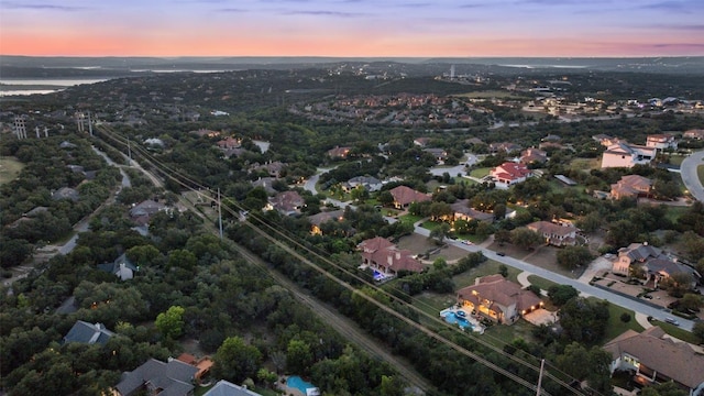 303 Bella Montagna Cir, Austin, TX 78734 - aerial view at dusk of a residential view