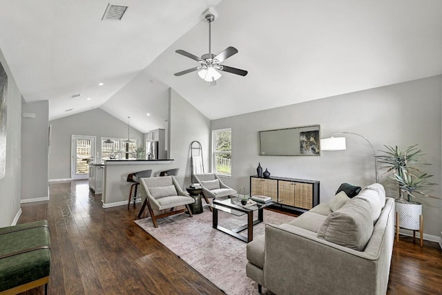 21003 Dodge Trl, Lago Vista, TX 78645 - living room with a ceiling fan, plenty of natural light, dark wood-style flooring, and high vaulted ceiling