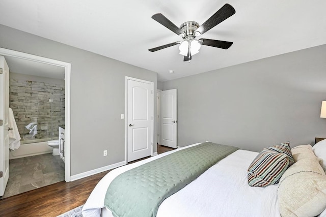 21003 Dodge Trl, Lago Vista, TX 78645 - bedroom featuring wood finished floors, a ceiling fan, and ensuite bathroom