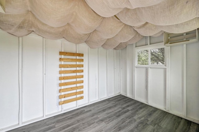 21003 Dodge Trl, Lago Vista, TX 78645 - unfurnished bedroom featuring wood finished floors