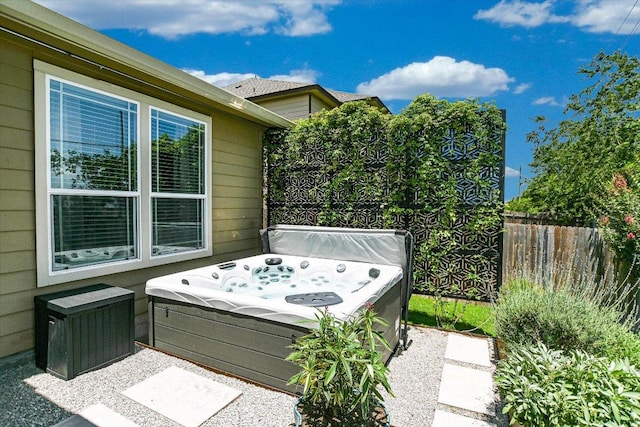 257 Culebra Dr, Georgetown, TX 78626 - wooden deck with a hot tub
