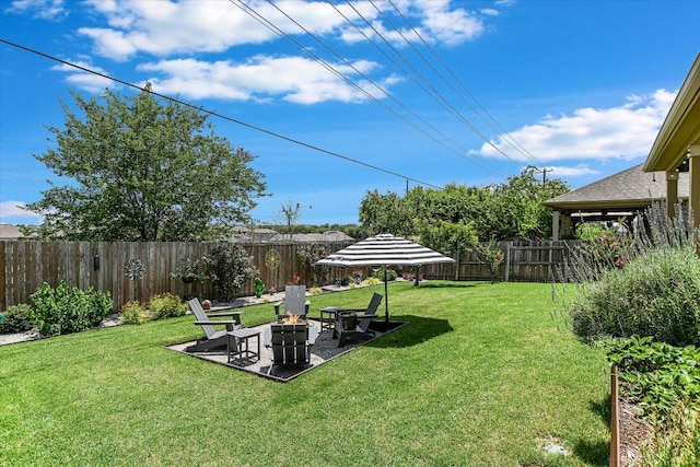 257 Culebra Dr, Georgetown, TX 78626 - view of yard featuring a fire pit and a patio area