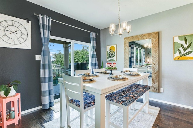 257 Culebra Dr, Georgetown, TX 78626 - dining area with a chandelier, dark wood-style flooring, and plenty of natural light