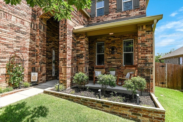 257 Culebra Dr, Georgetown, TX 78626 - entrance to property featuring a porch and brick siding