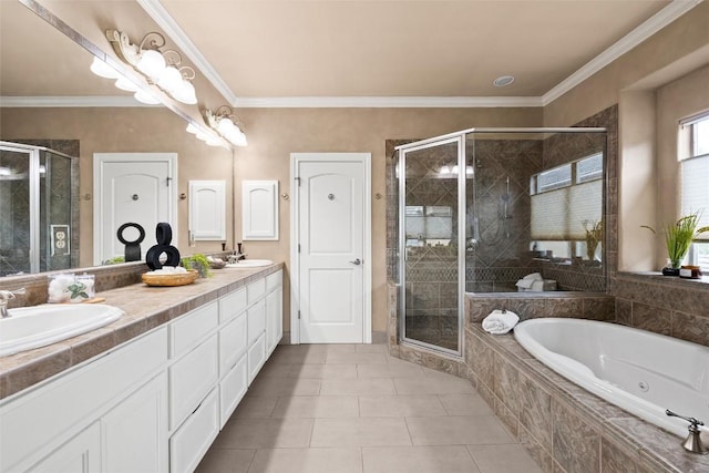 8546 Adirondack Trl Unit 14, Austin, TX 78759 - bathroom with double vanity, a tub with jets, a shower stall, tile patterned flooring, and crown molding