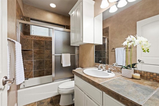 8546 Adirondack Trl Unit 14, Austin, TX 78759 - bathroom with vanity and shower / bath combination with glass door