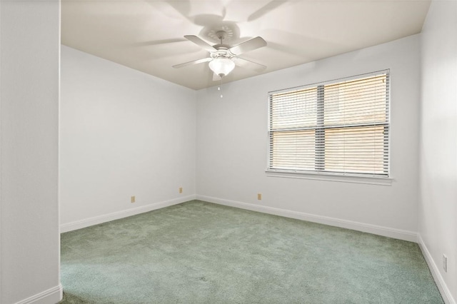 8546 Adirondack Trl Unit 14, Austin, TX 78759 - carpeted spare room with baseboards and a ceiling fan