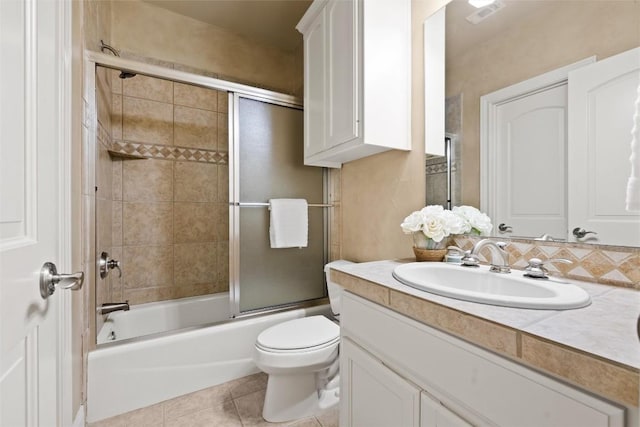 8546 Adirondack Trl Unit 14, Austin, TX 78759 - bathroom featuring vanity, combined bath / shower with glass door, and tile patterned flooring