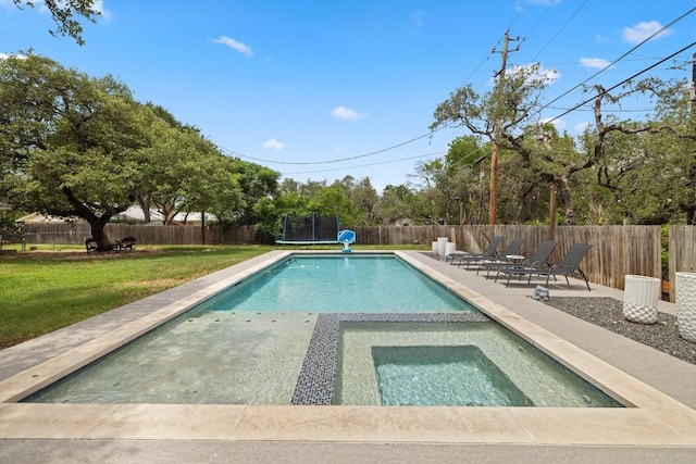 13201 Stillforest St, Austin, TX 78729 - view of swimming pool with a trampoline, a patio, and an in-ground hot tub