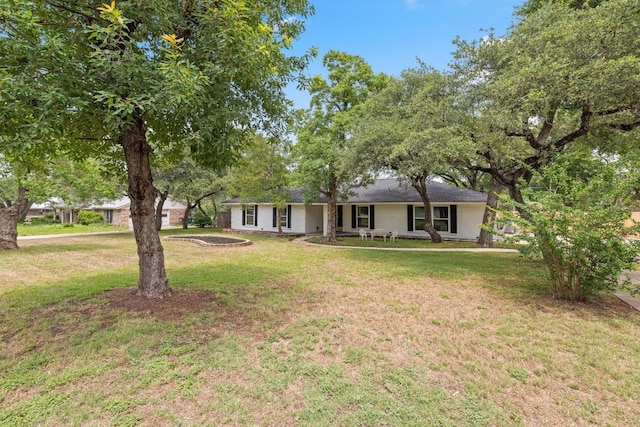 13201 Stillforest St, Austin, TX 78729 - ranch-style home featuring a front lawn