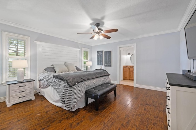 13201 Stillforest St, Austin, TX 78729 - bedroom with dark wood-type flooring, baseboards, crown molding, a ceiling fan, and ensuite bath