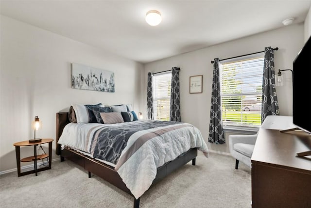 320 Bright Star Ln, Georgetown, TX 78628 - bedroom featuring light colored carpet and baseboards