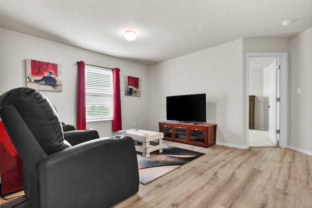 320 Bright Star Ln, Georgetown, TX 78628 - living room featuring wood finished floors and baseboards