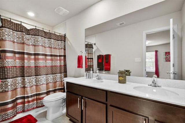 320 Bright Star Ln, Georgetown, TX 78628 - bathroom with double vanity and a shower with curtain